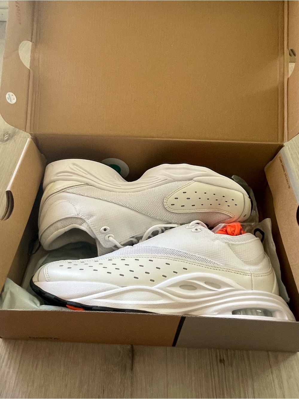 Nike White Sneakers with Orange Tongue Accent